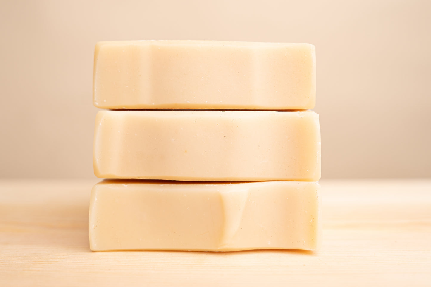 Pure tallow soap bar on rustic wooden surface